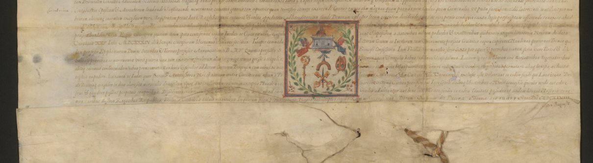Pożółkły rękopis z napisem Vlaidslaus na górze, pod spodem dwie okrągłe pieczęcie z laki zamocowane na sznurkach.